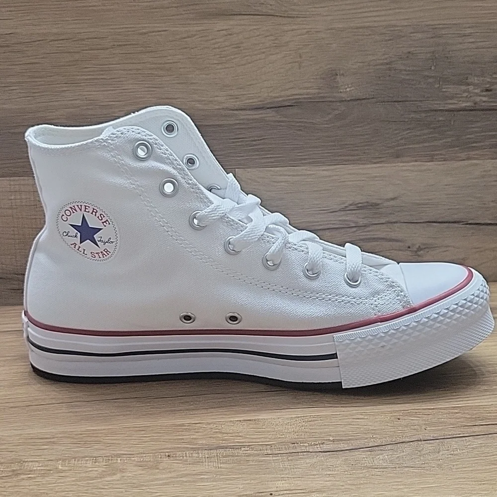 Converse White Sneakers with Blue Star Logo
